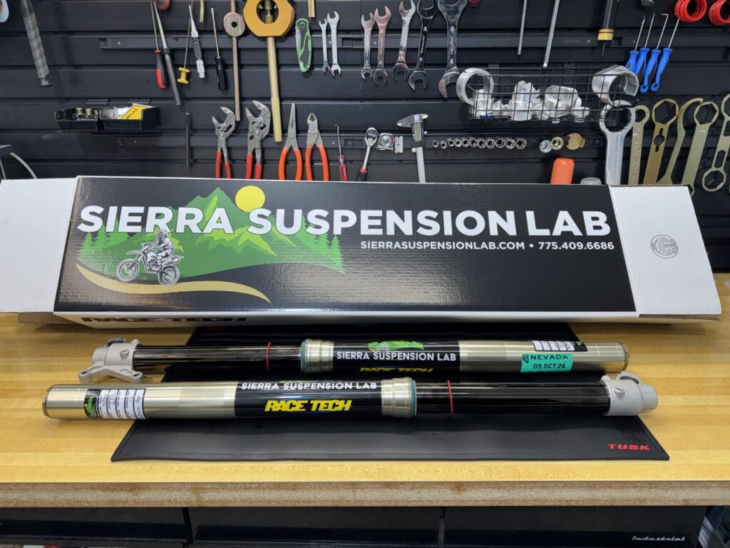Sierra Suspension Lab bike shock absorber with box and tools.